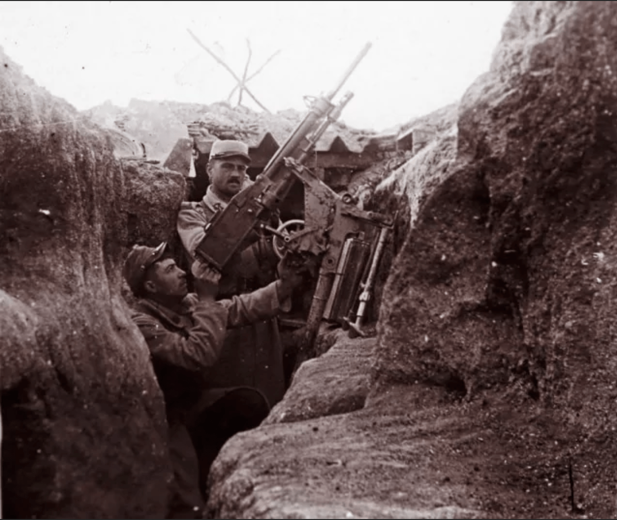 A-French-soldier-aiming-an-anti-aircraft-machine-gun-from-a-trench-at-Perthes-les-Hurlus-eastern-France.-Telegraph.png